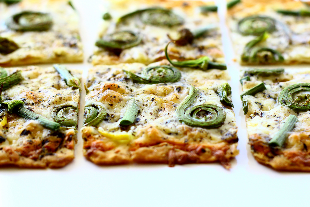 Flatbread with Fiddlehead Ferns, Onion Scapes and Pecorino