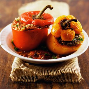 Lamb-Stuffed Peppers in Spiced Tomato Sauce