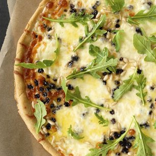 Mozzarella Pizza with Pine Nuts, Currants and Arugula